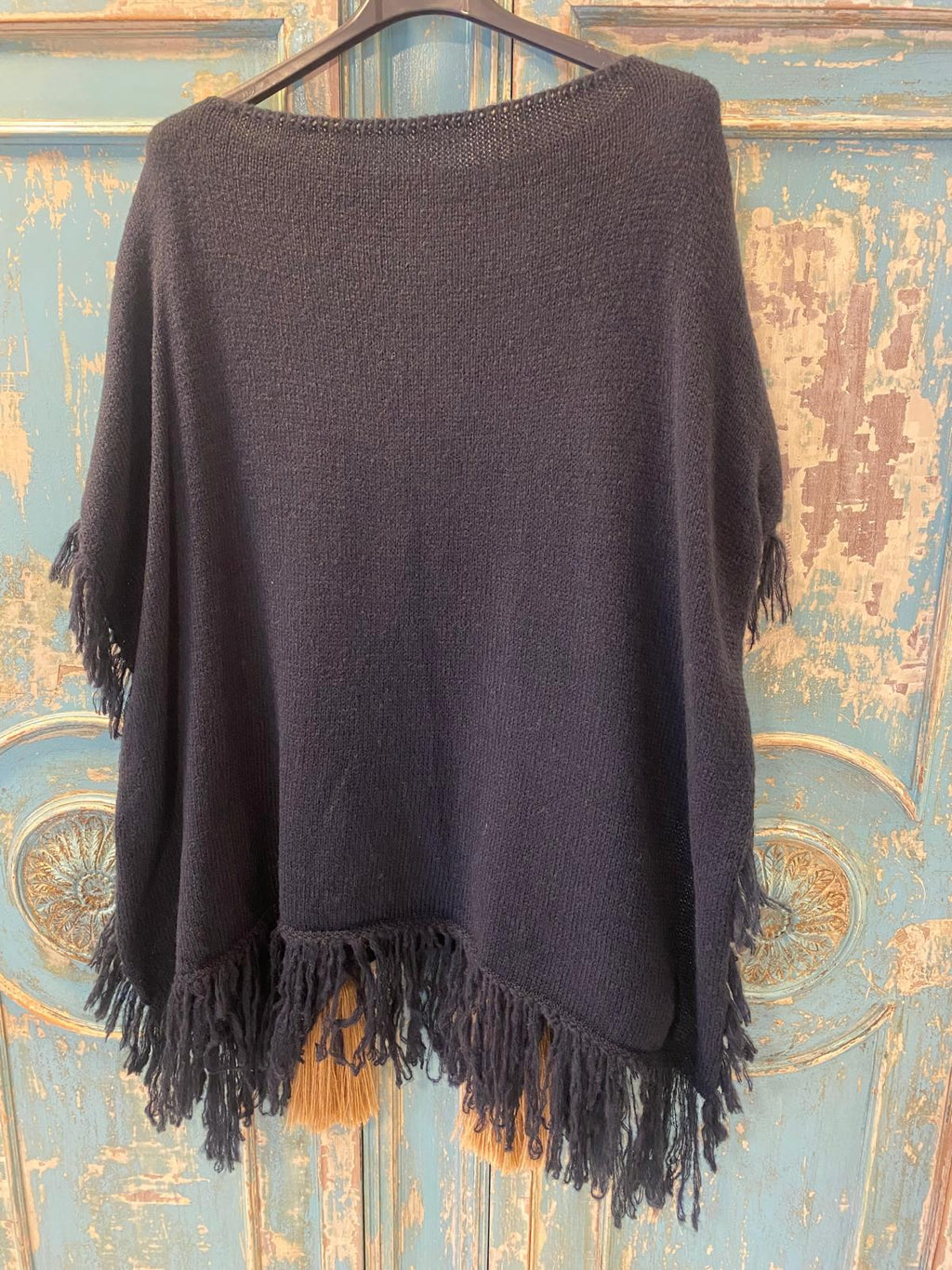 Poncho punto flecos DONDOLA