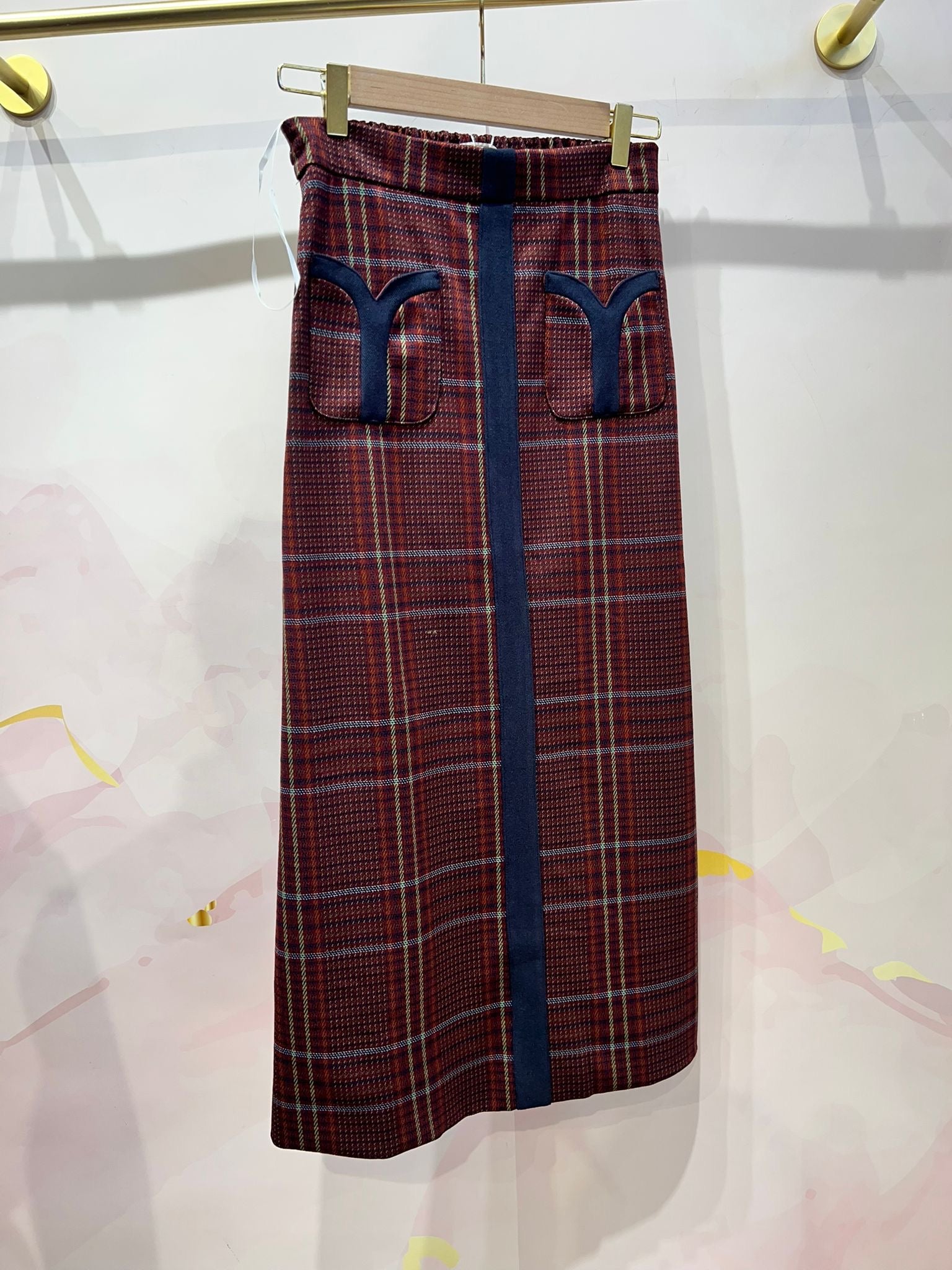 Falda cuadros detalle bolsillos delanteros DONDOLA