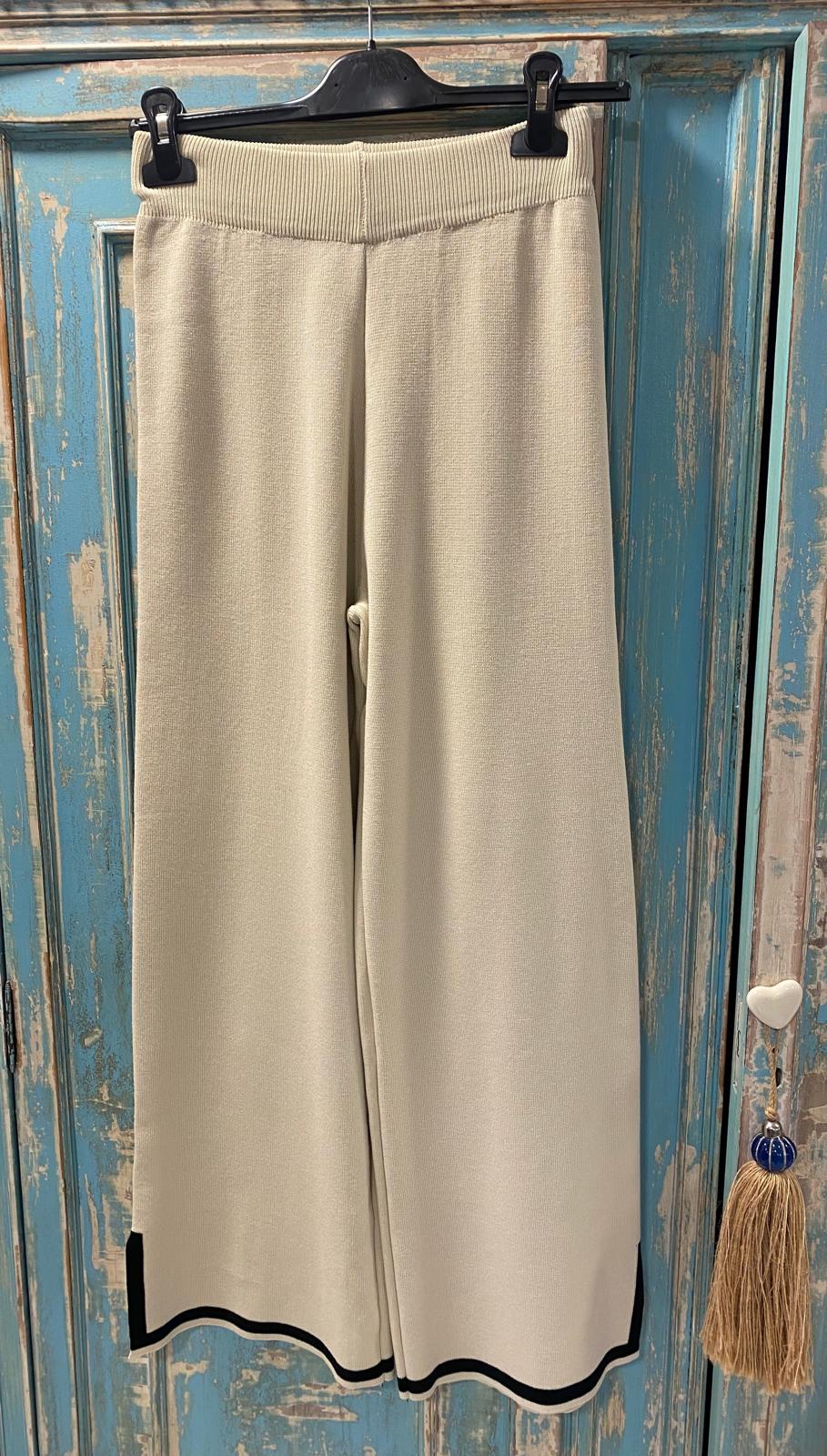 Conjunto punto beige acabados ribeteados DONDOLA