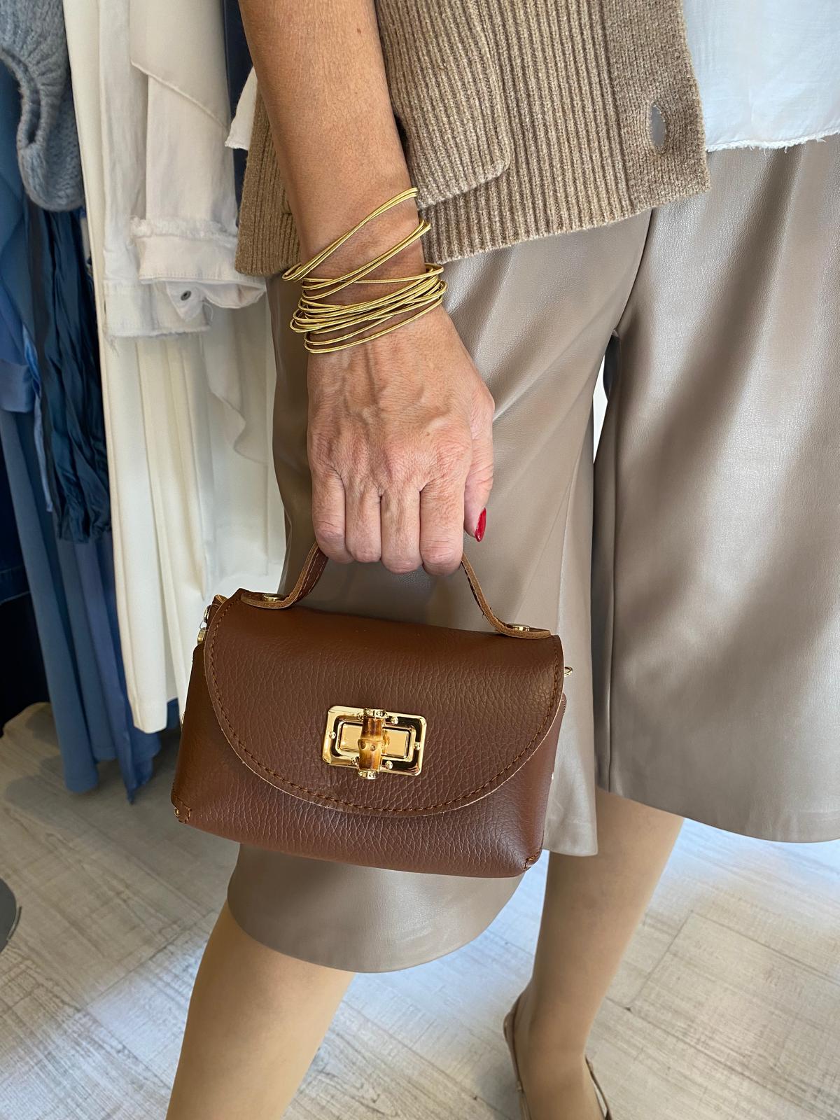 Bolso piel tamaño mini cadena metálica dorada DONDOLA