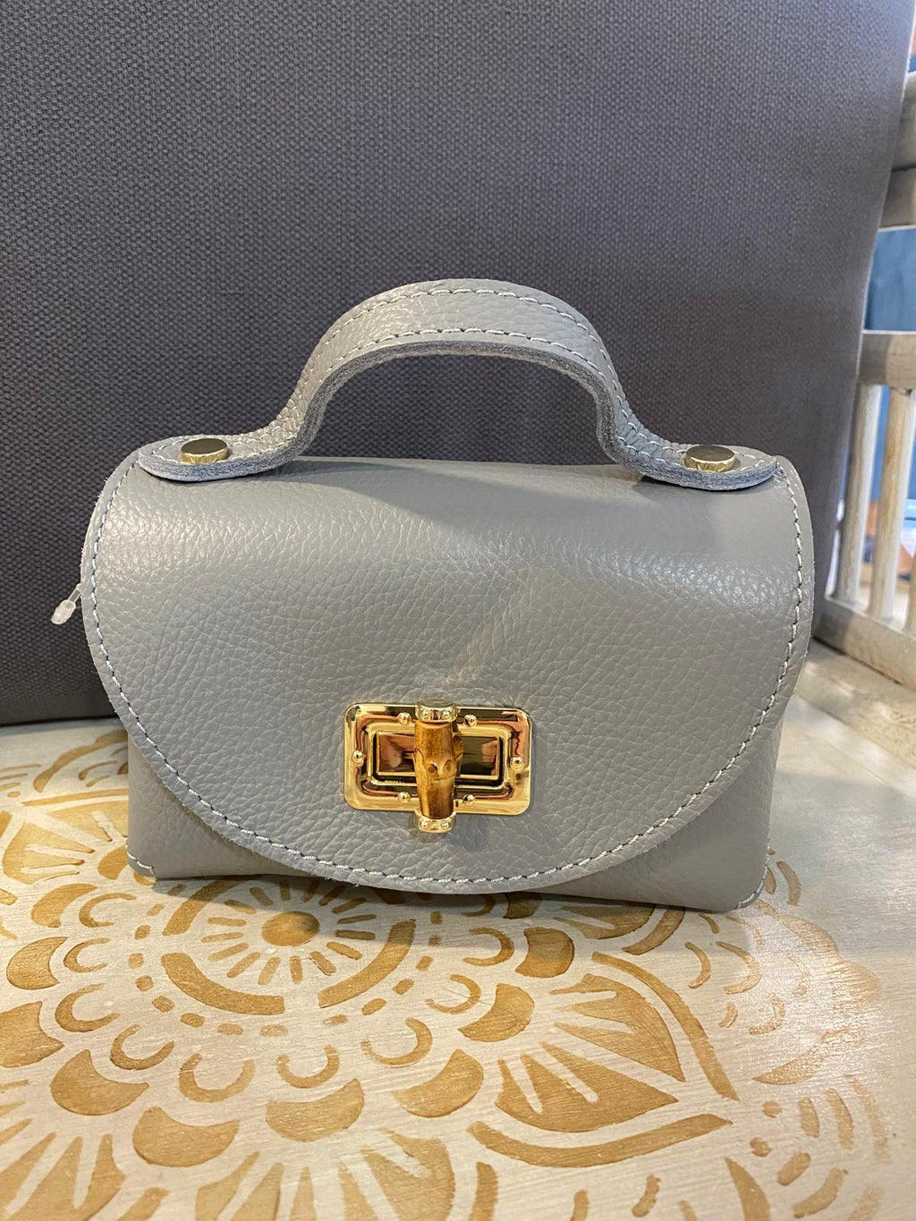 Bolso piel tamaño mini cadena metálica dorada DONDOLA