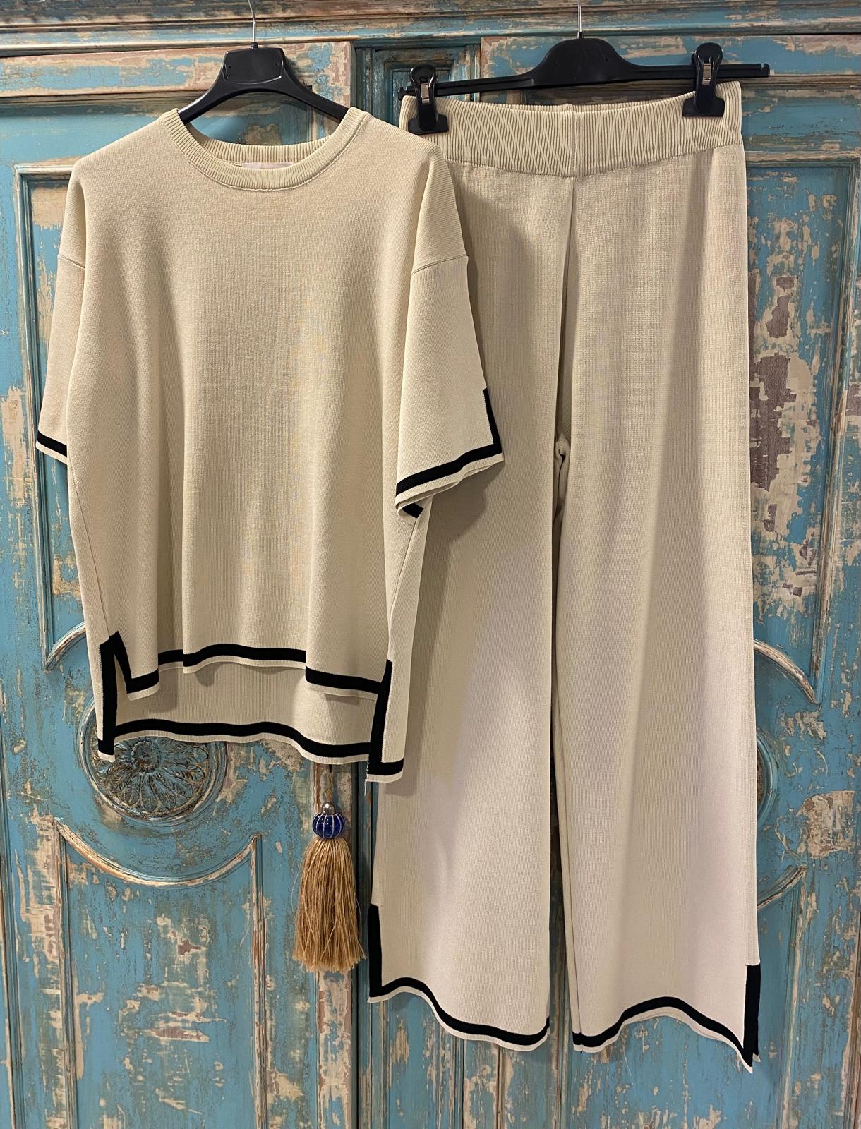 Conjunto punto beige acabados ribeteados DONDOLA