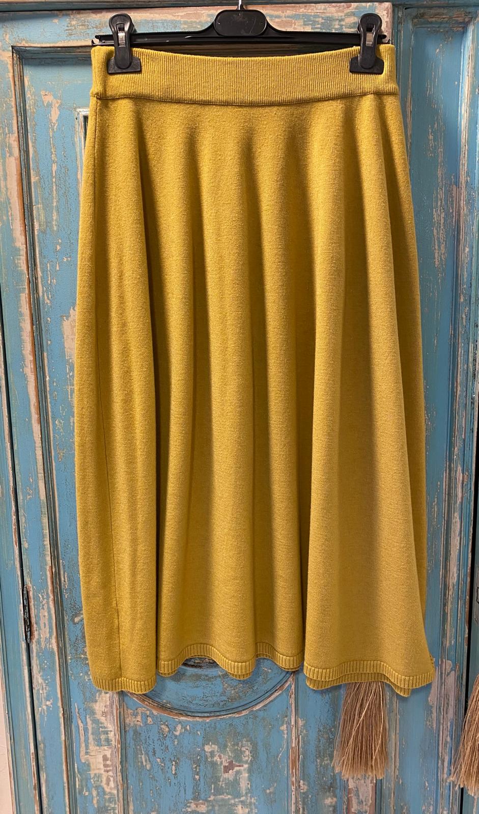 Falda punto de vuelo color mostaza DONDOLA