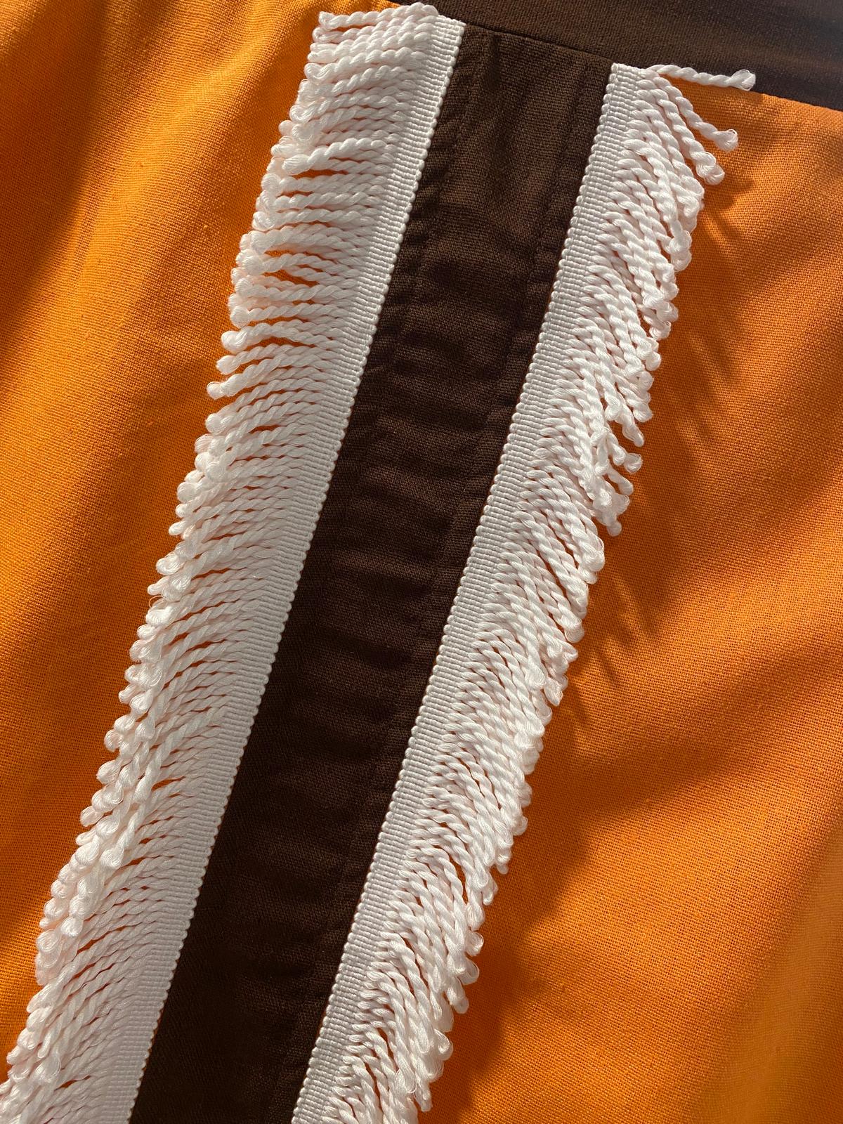 Falda mezcla lino detalle central flecos DONDOLA