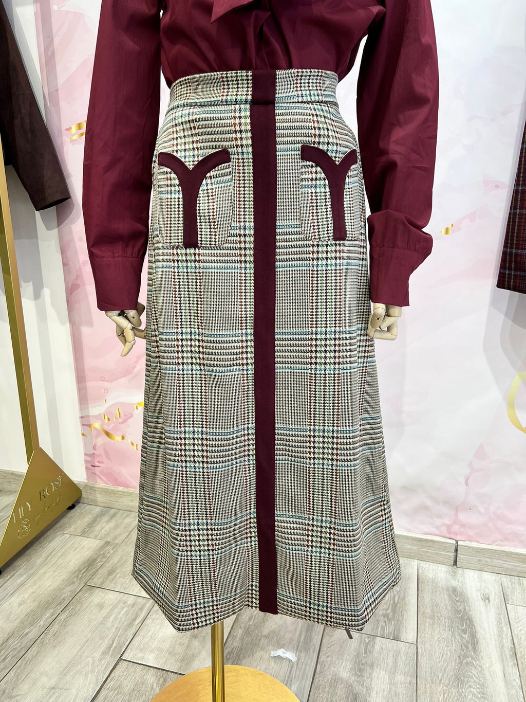 Falda cuadros detalle bolsillos delanteros DONDOLA