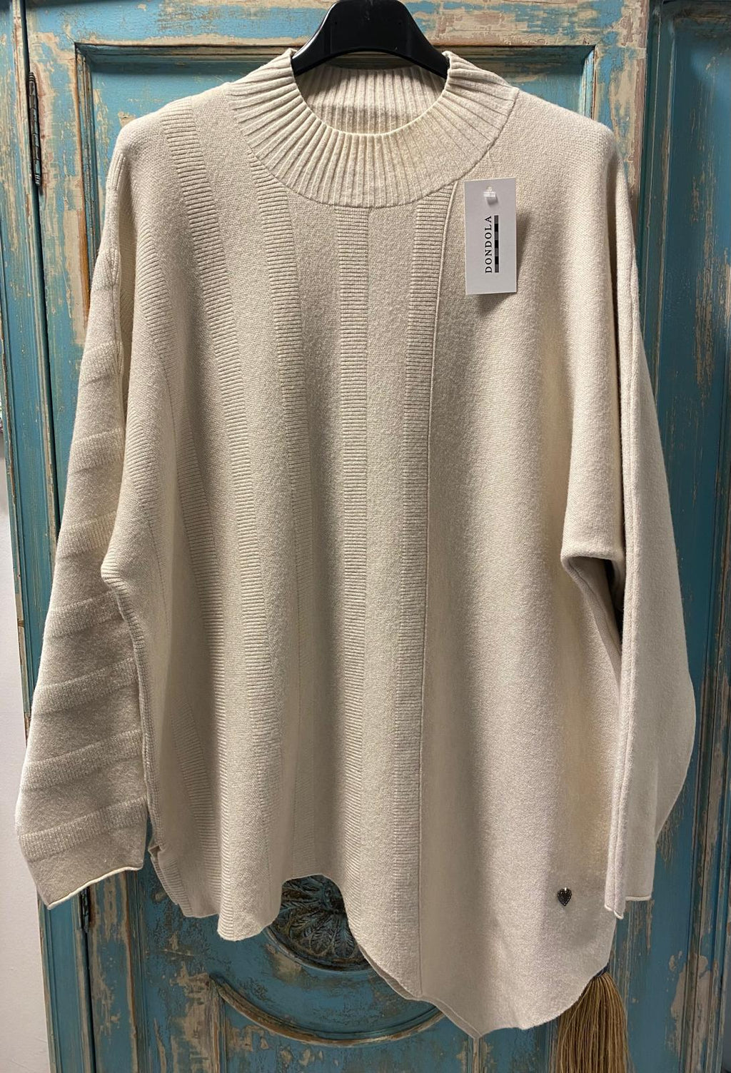 Jersey ancho bajo desigual detalle dibujo estriado DONDOLA