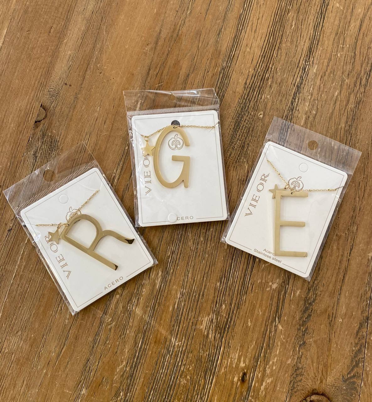 Colgante letra acero DONDOLA