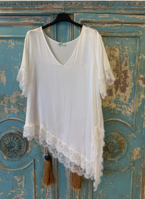 Blusa lencera manga corta bajo desigual