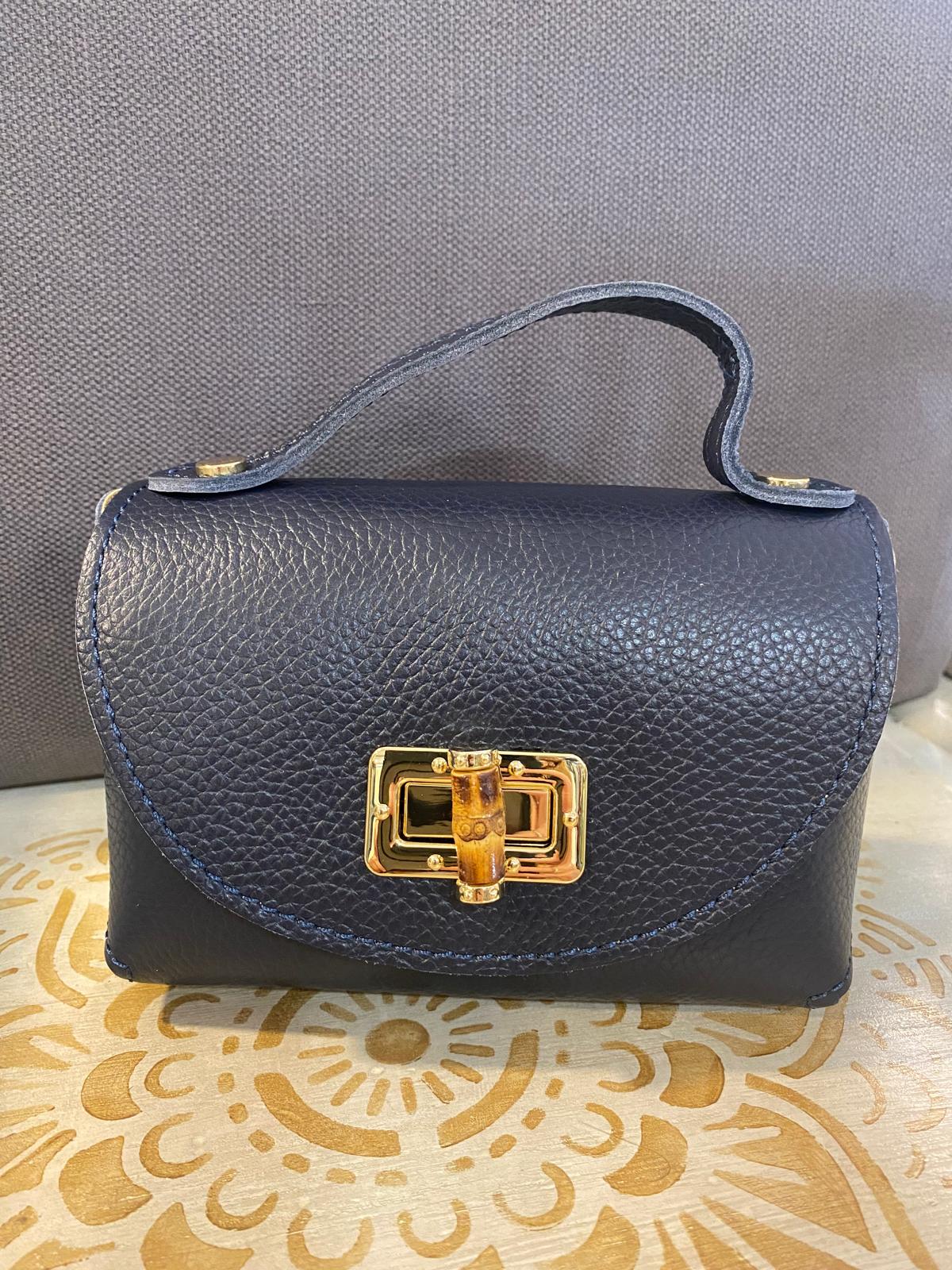 Bolso piel tamaño mini cadena metálica dorada DONDOLA