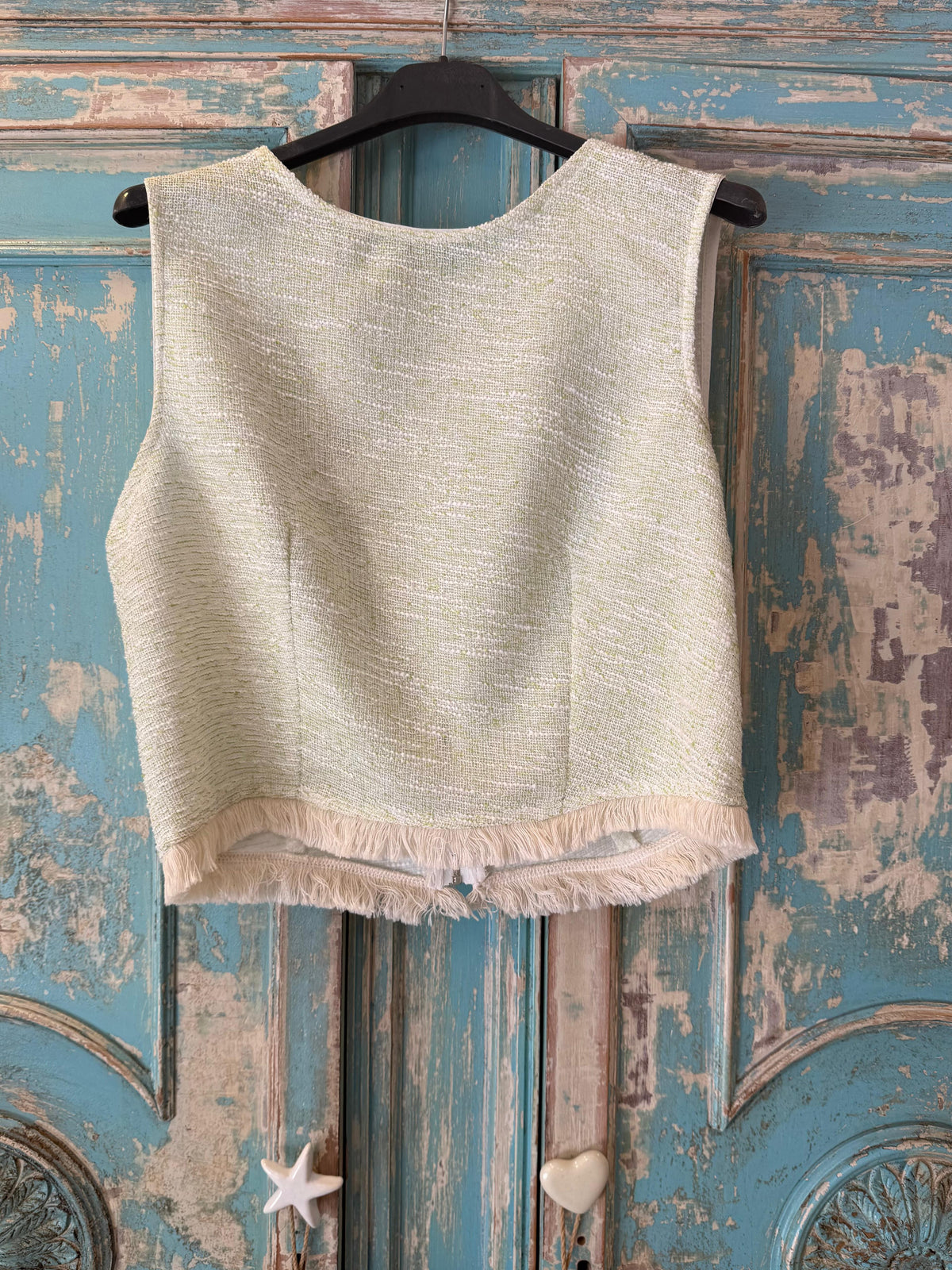 Conjunto verde con flecos
