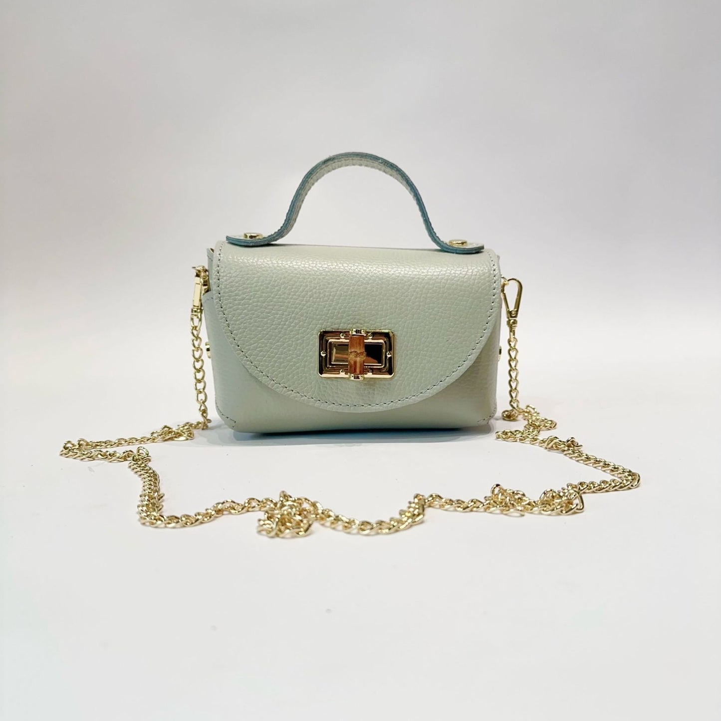 Mini Bolso de Piel con Cierre Dorado - Elegante y Compacto