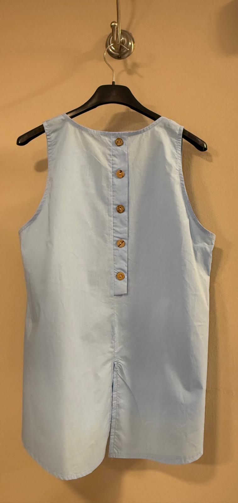 Blusa botones traseros