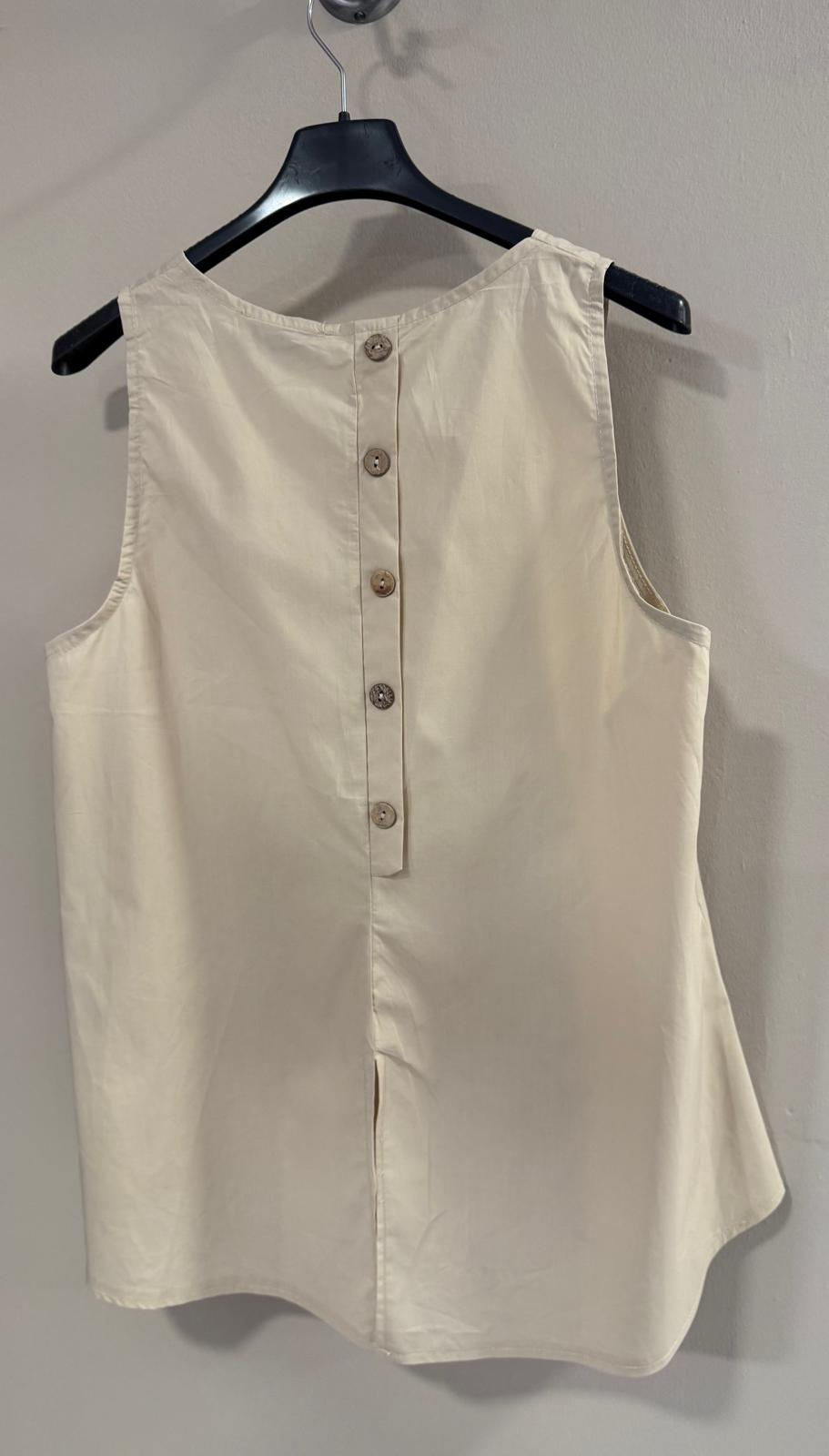 Blusa botones traseros